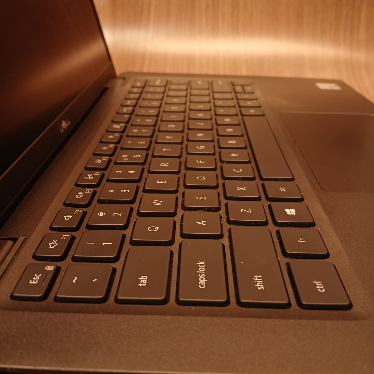 Dell Latitude 7410 keyboard and touchpad angled close-up