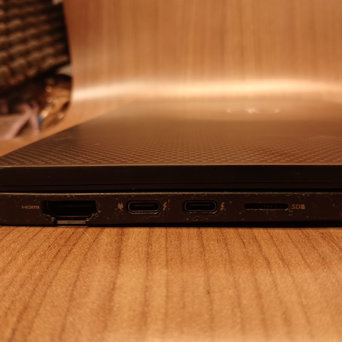 Dell Latitude 7410 left side ports showing HDMI, USB-C, Thunderbolt, and microSD slot