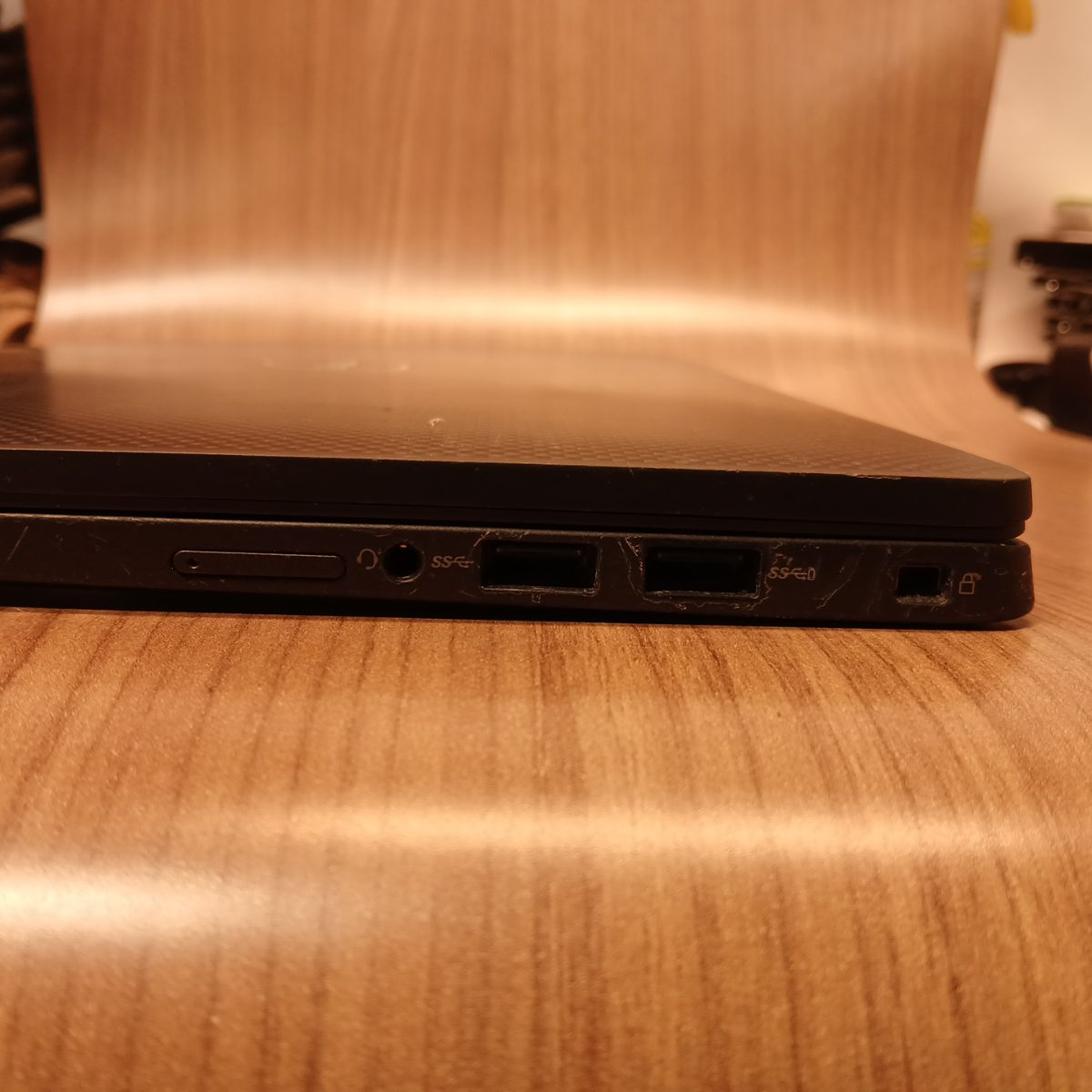 Dell Latitude 7410 right side ports showing headphone jack, USB ports, and lock slot