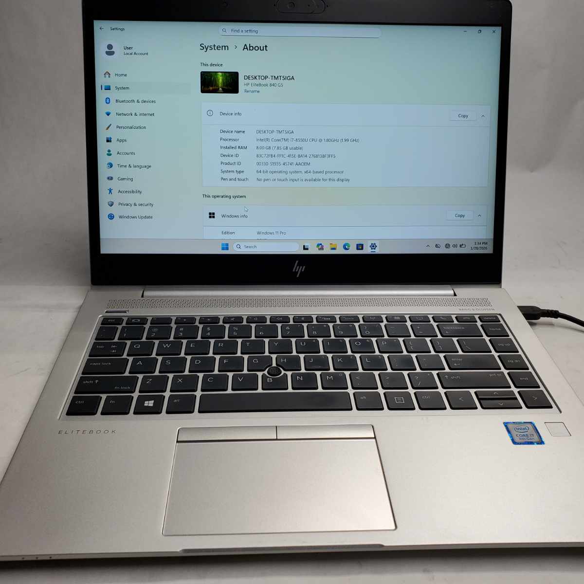 HP EliteBook 840 G5 open showing Windows 11 system information screen