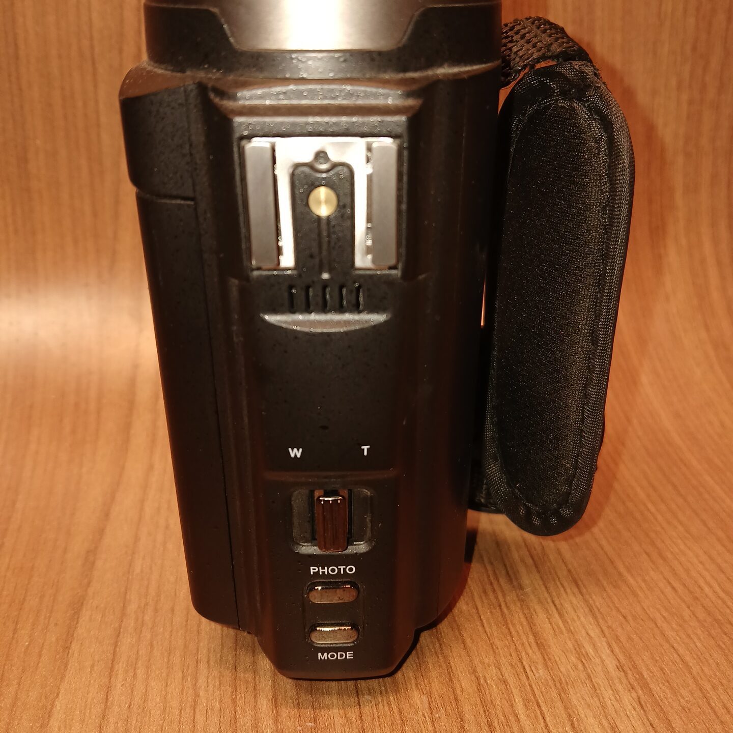 HDV-514K Plus digital camcorder top view with photo mode and zoom controls