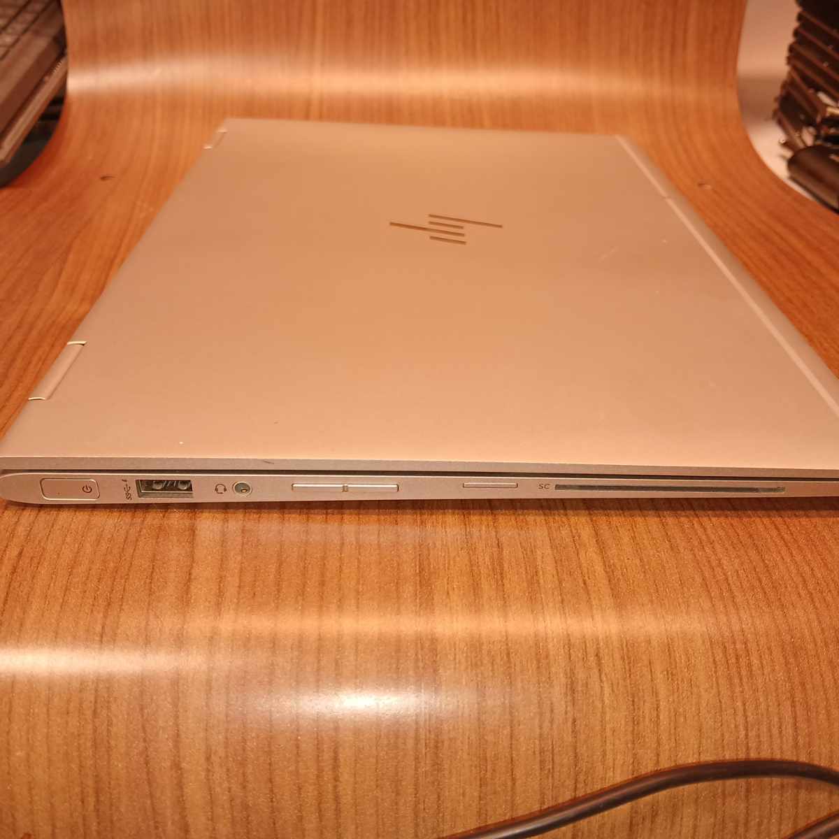 Front edge of HP EliteBook x360 1030 G2 with power button, USB port, audio jack and smart card slot