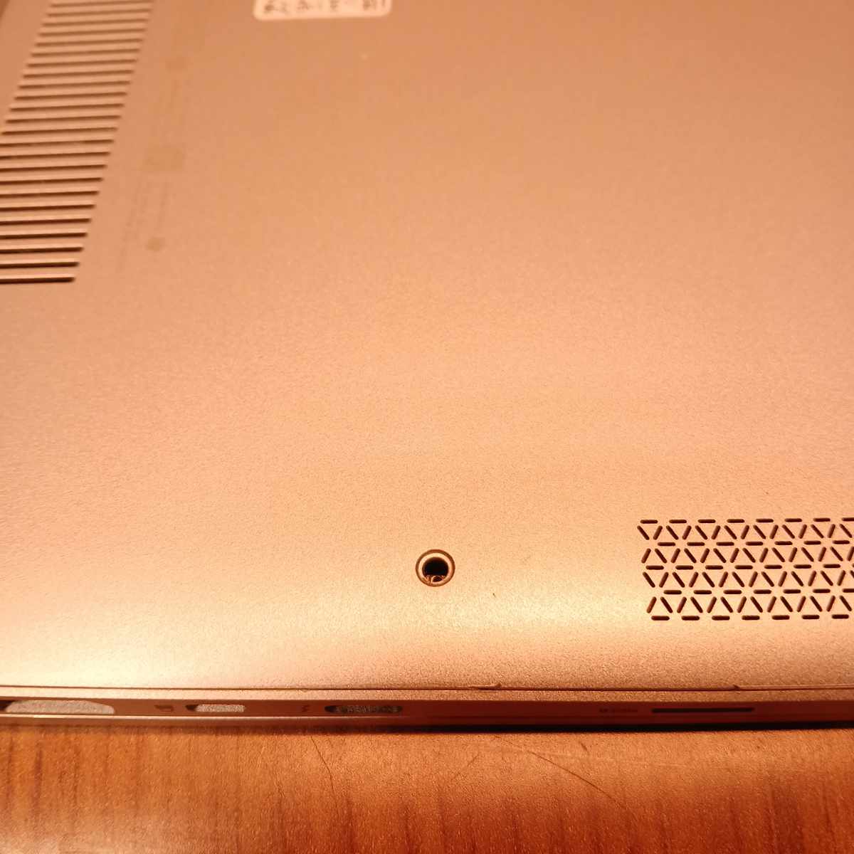 HP EliteBook x360 1030 G2 bottom cover showing ventilation slots and screw hole missing screw