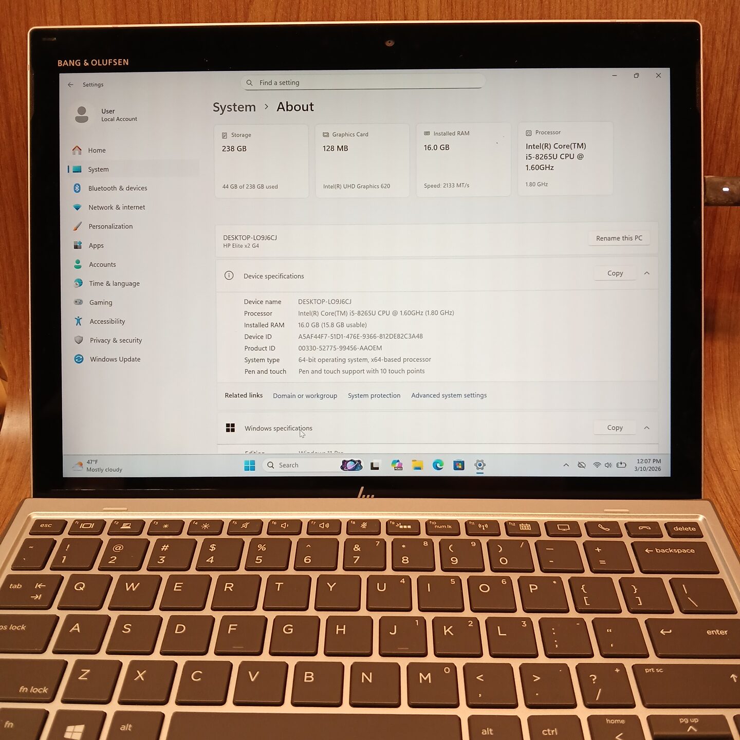 HP Elite x2 G4 laptop tablet showing Windows system specifications with Intel Core i5 and 16GB RAM