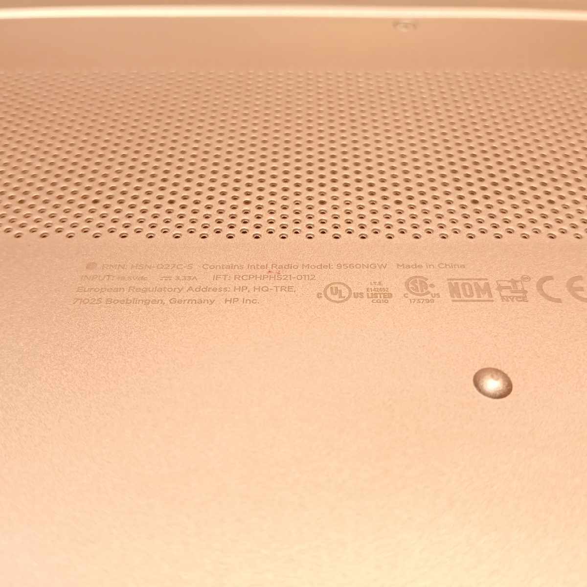 HP ProBook 450 G8 bottom panel close-up with regulatory markings