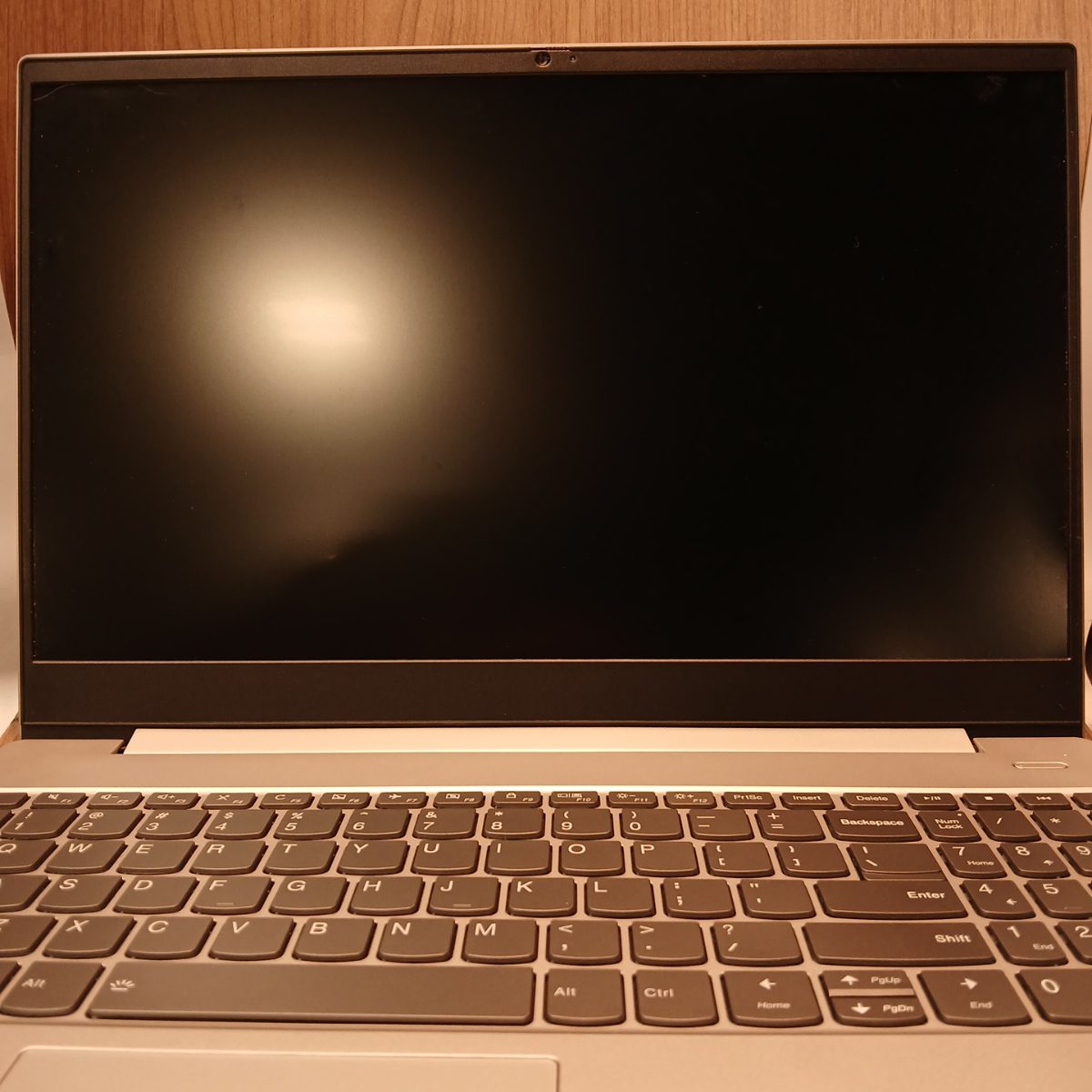 Front view of Lenovo IdeaPad S340-15IWL laptop with display open and keyboard visible