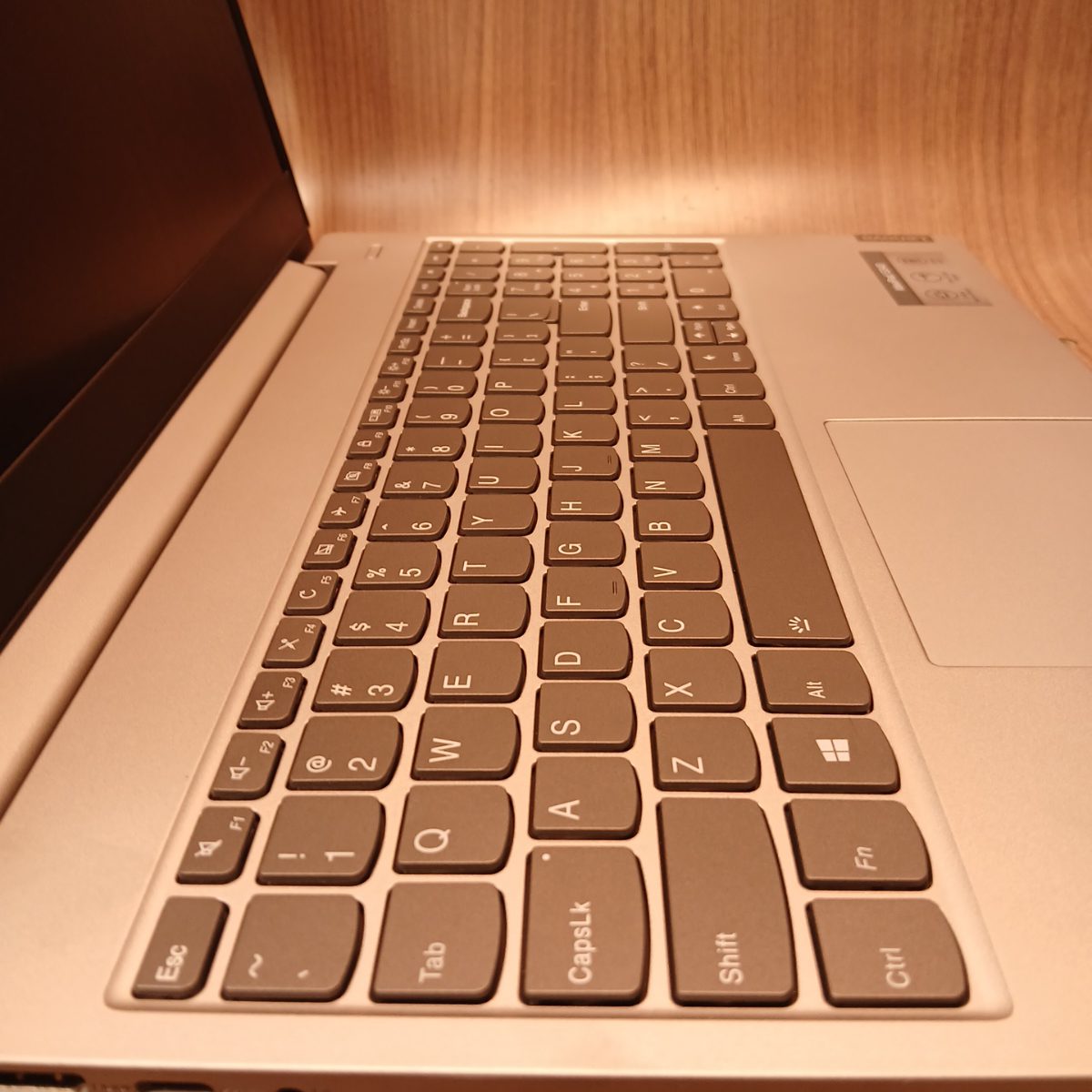 Angled view of Lenovo IdeaPad S340-15IWL keyboard and right palm rest