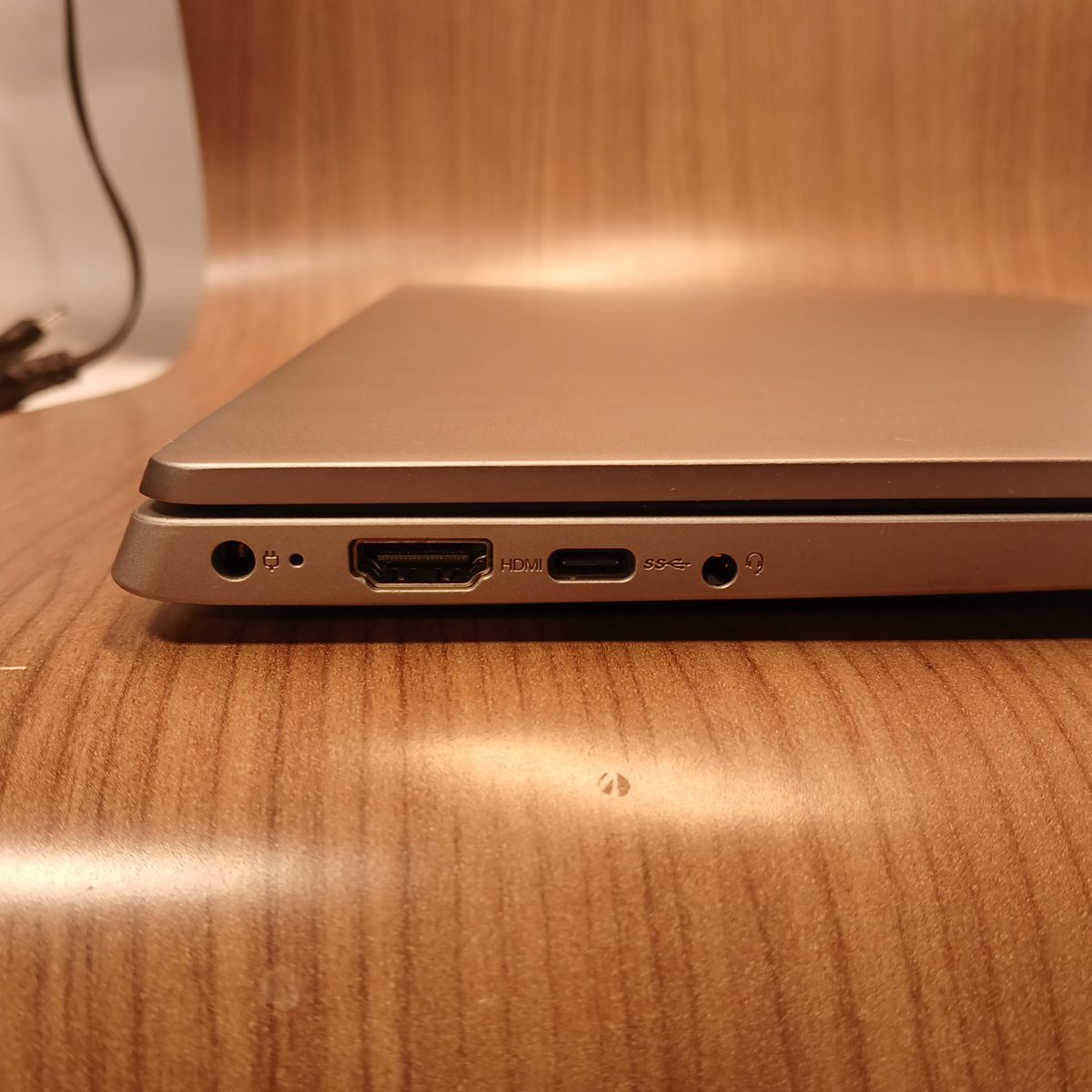 Left side ports on Lenovo IdeaPad S340-15IWL including power, HDMI, USB-C, and headphone jack