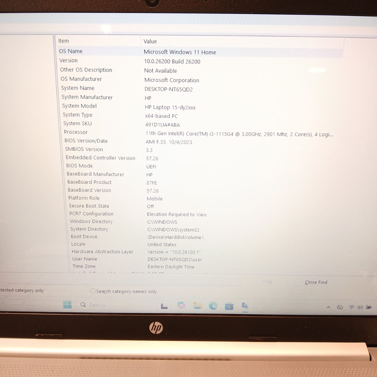 HP 15-dy2091wm laptop displaying detailed Windows 11 system specs screen
