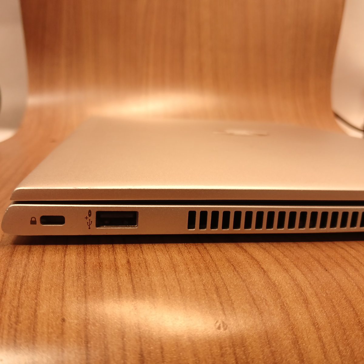 Left side of HP ProBook 440 G6 showing USB port, vent, and security lock slot
