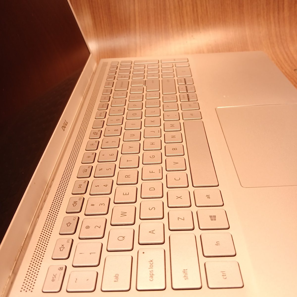 Angled keyboard view of Dell Inspiron 15 7501 silver laptop