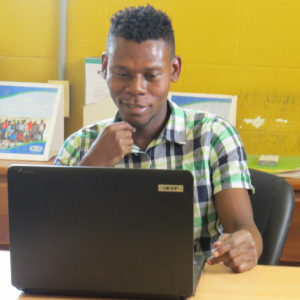 Haiti student with laptop