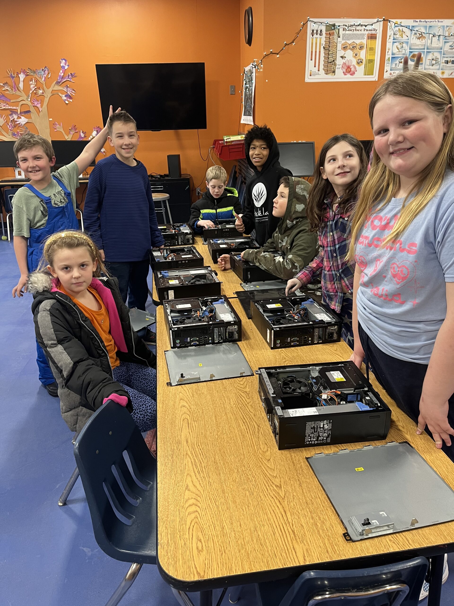 "Students assembling desktop computers at the Alfond Youth and Community Center in Waterville, Maine